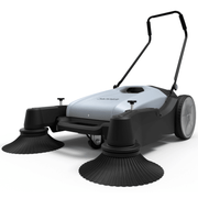 Dapper Supply walk-behind push floor sweeper angle view.