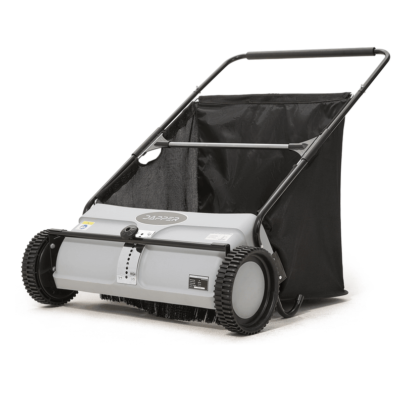Dapper Supply push lawn sweeper angled view with hopper bag and reinforced brushes.