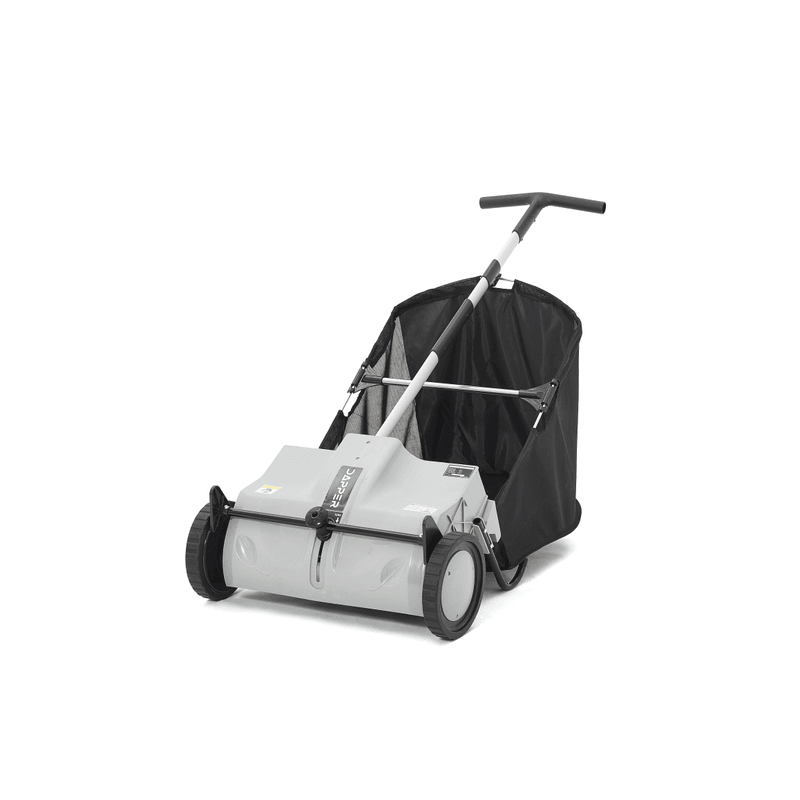Dapper Supply 22-inch push lawn sweeper front angle with mesh collection bag.