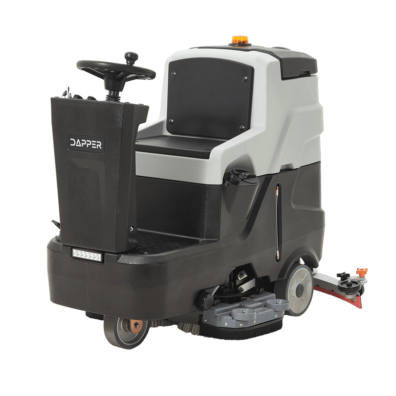 Dapper Supply ride-on floor scrubber front angle with steering wheel and brush deck.