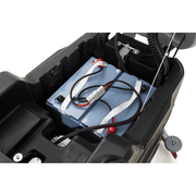 Dapper Supply ride-on floor scrubber included batteries installed in the battery compartment.