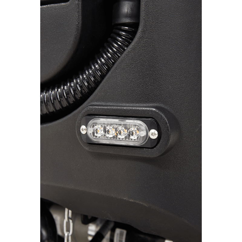 Dapper Supply ride-on floor scrubber rear LED light close up.