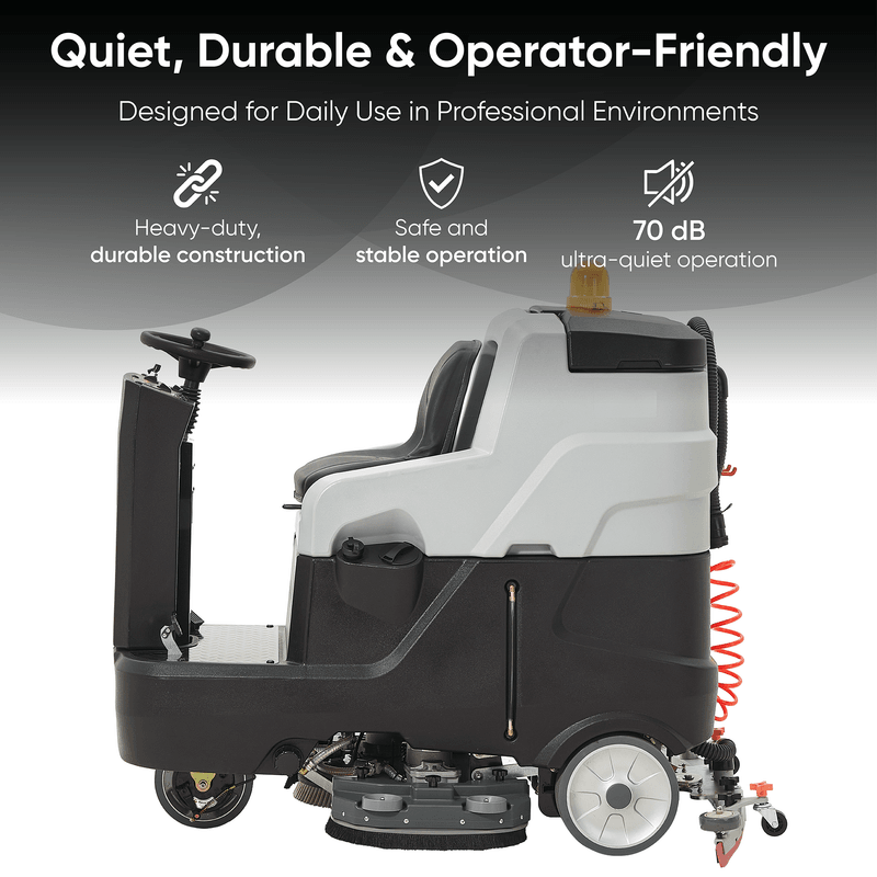 Dapper Supply ride-on floor scrubber side view highlighting quiet 70 dB operation.