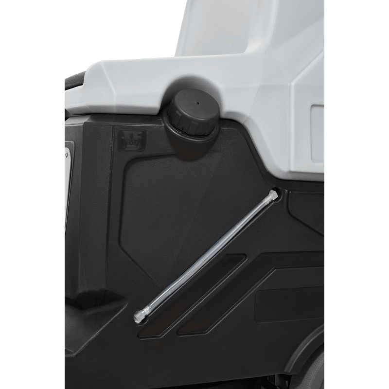 Dapper Supply ride-on floor scrubber solution tank fill cap and drain tube close up.