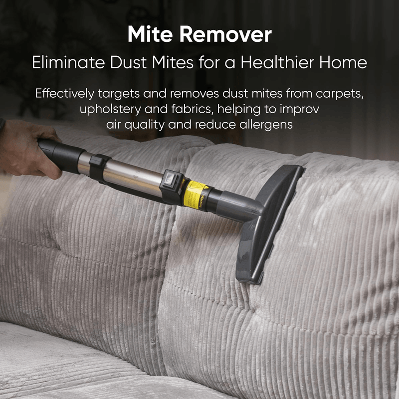 Dapper Supply carpet and upholstery extractor mite remover cleaning a fabric sofa.