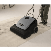 Dapper Supply 26-inch wide area vacuum in use removing debris from a large carpeted floor.