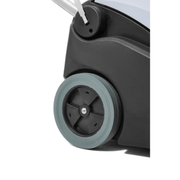 Dapper Supply wide area vacuum large rear drive wheel detail.