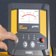 Tramex DS2 - Dec Scanner Control Panel in Use Image showing the Tramex DS2 Dec Scanner's control panel with user interface, buttons, and display activated, illustrating its functionality in a practical setting.