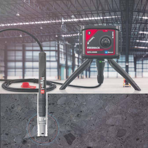 Tramex Feedback Datalogger Starter Kit - FBSK A detailed cut-away image showing the Tramex DL-RHTX Hygro i2 probe encapsulated in a protective sleeve, designed for measuring moisture and psychrometric conditions in concrete, positioned in a warehouse setting.
