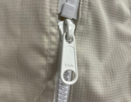 Zips in where the door was