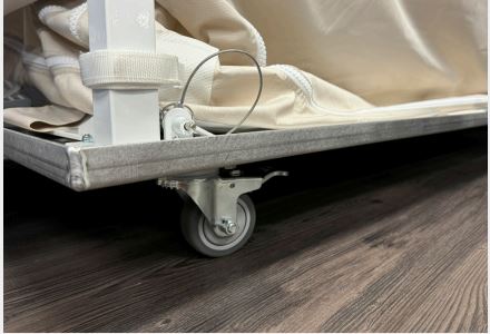 Caster and rail under the frame
