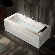 Empava EMPV-67JT351LED alcove tub in a dark room, angled view