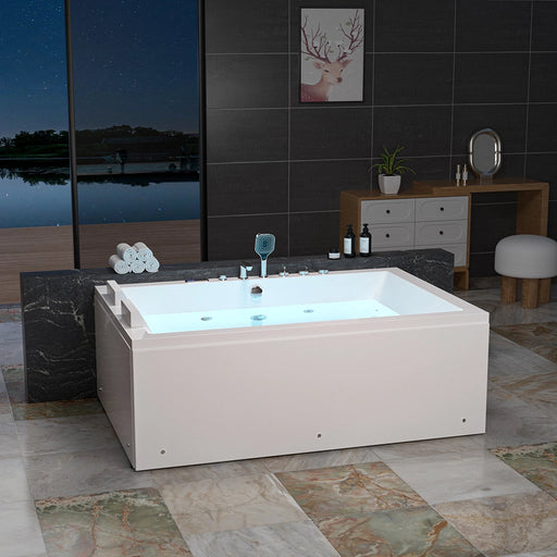 Empava EMPV-71PRO04 two-person tub against a stone ledge, angled view