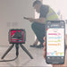 Tramex Flooring Master Kit - FMK A man using a Tramex meter with an iPad app, displaying live readings while inspecting flooring in a professional setting.