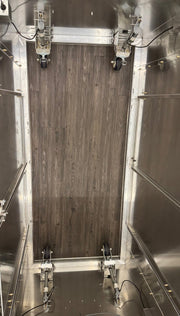 FloorZone interior from above showing the open floor and four corner actuators