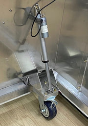 FloorZone corner electric actuator mounted above a locking caster