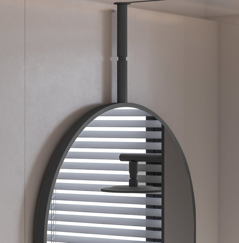 Laviva 313MFCPL-2440MB Hanging Pill 24" x 40" Matte Black mirror, hanging in a shower room, close-up