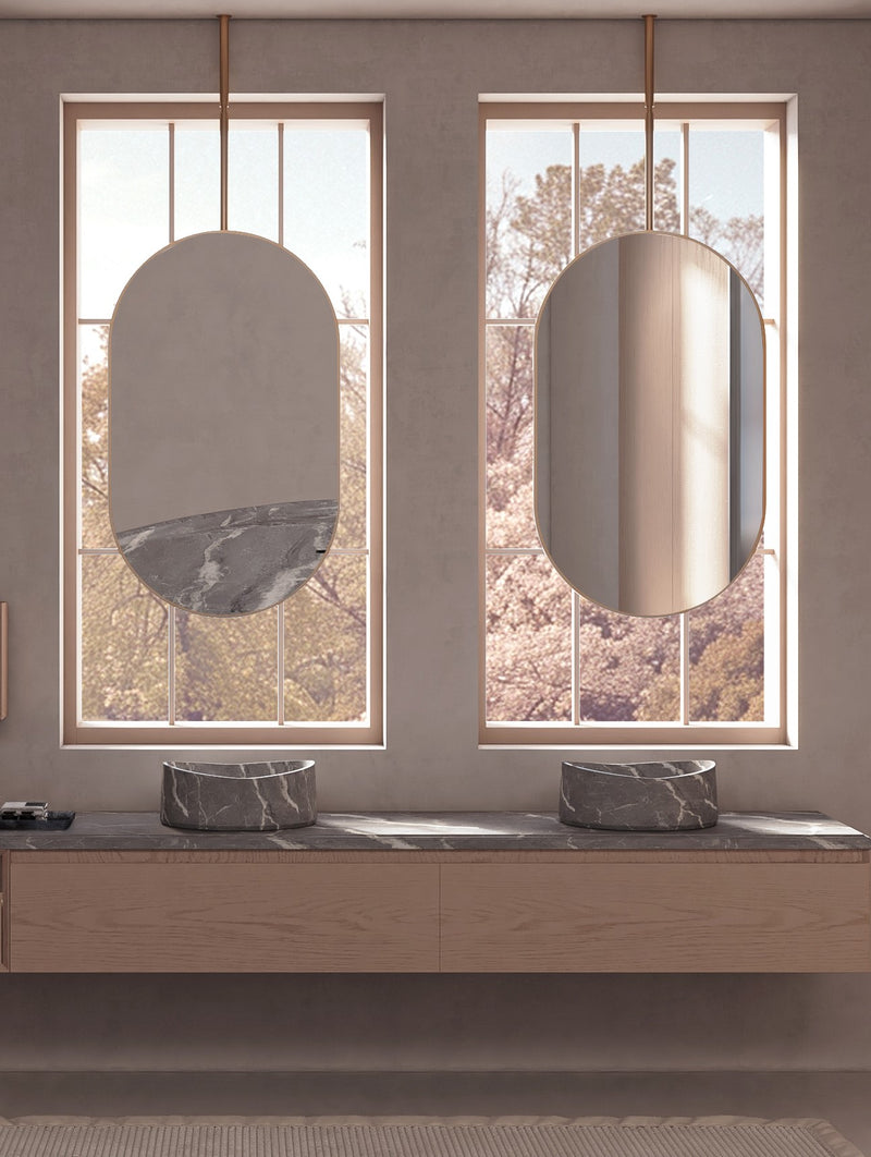 Laviva 313MFCPL-2440SB Hanging Pill 24" x 40" Satin Brass mirror, hung from the ceiling in a bathroom, pair shown