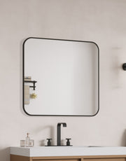 Laviva 313MFLAT-3636MB Latitude 36" x 36" Matte Black mirror, installed above a vanity