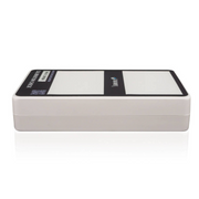 Tramex SKIPPER 5 Calibration Check Box - CALBOXSMM5 A rectangular calibration check box with a textured surface, featuring a transparent window to display a digital reading, designed for moisture measurement accuracy.