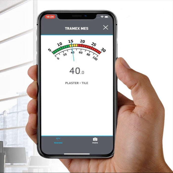 Tramex ME5 - Moisture Encounter ME5: Image shows the Tramex ME5 moisture meter with a ceiling extension handle, designed for easy access during building inspections to detect moisture levels in various materials.