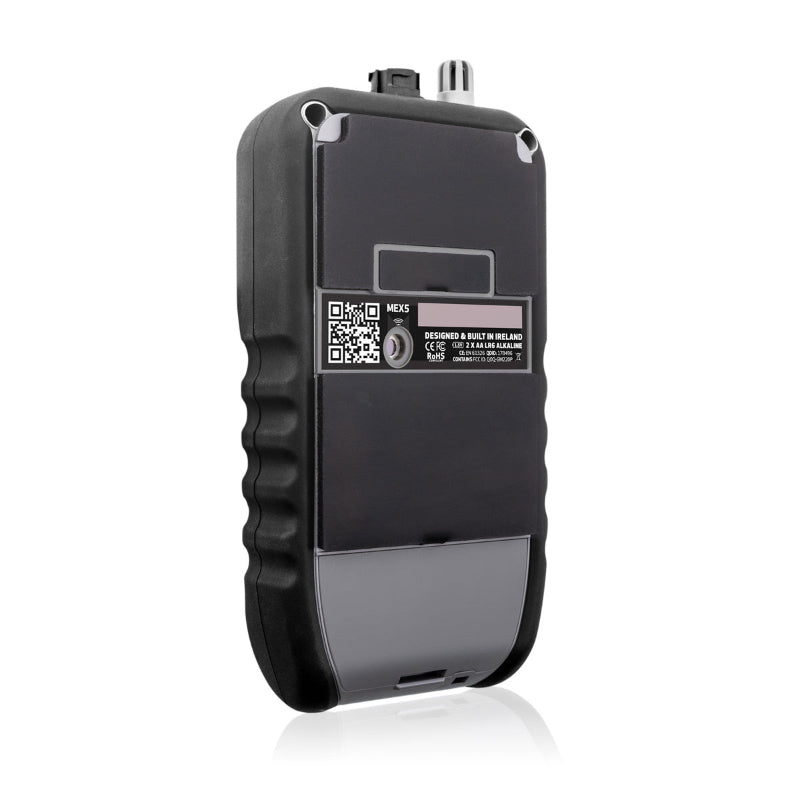 Tramex MEX5 - Moisture Encounter MEX5, a close-up view of the MEX5 moisture meter showing its back side and angle. The device features a sleek design with a digital display and various controls.