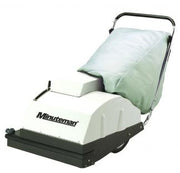 Minuteman 747 battery wide-area carpet vacuum with grey cloth filter bag and loop handle, front three-quarter view on white