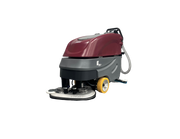 Minuteman E26 walk-behind disc scrubber with twin brush deck and yellow drive wheel