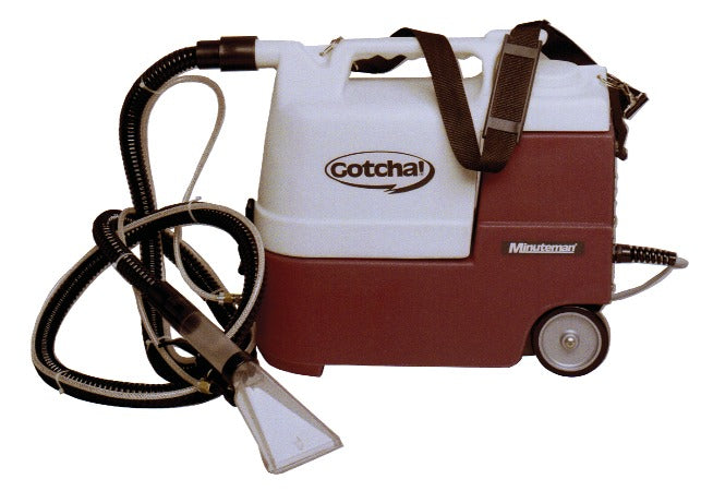 Minuteman Gotcha 2 gal carpet spot extractor in maroon and white with hose, 4" clear hand tool and shoulder strap, side view