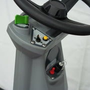 Max Ride steering column with green lever, toggle and key switch close-up