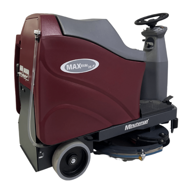 Minuteman Max Ride 26 rider floor scrubber, right side view, shown with optional disc brushes (not included; ships with two 13" pad drivers)