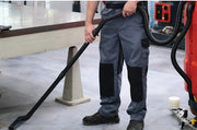 Minuteman Scrubmaster B120 R optional off-aisle vacuum wand (not included) cleaning under a workbench