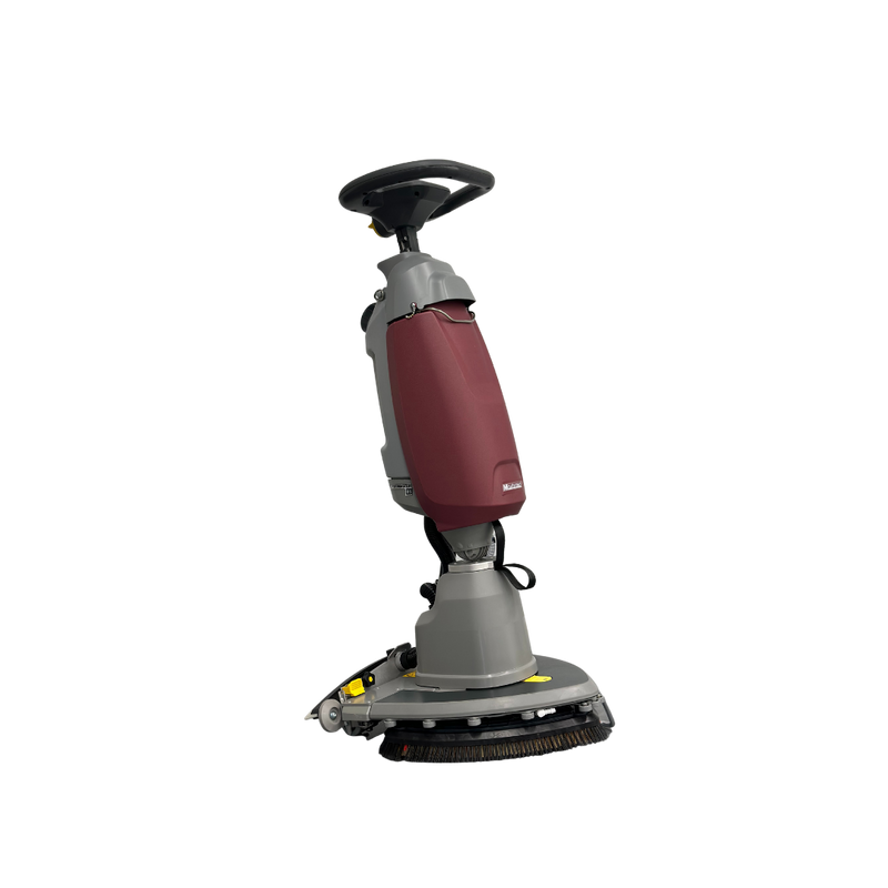 Minuteman Scrubmaster B5 17-inch orbital floor scrubber, three-quarter view, shown with an optional orbital brush (not included; ships with an orbital pad holder and red pads)