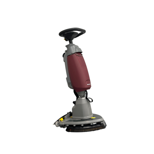 Minuteman Scrubmaster B5 17-inch orbital floor scrubber, three-quarter view, shown with an optional orbital brush (not included; ships with an orbital pad holder and red pads)