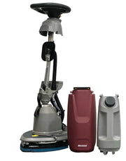 Scrubmaster B5 frame with maroon recovery tank and grey solution tank removed beside it on white