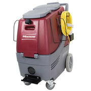 Minuteman Total Restroom System front angle view with cord on its hooks and chemical bottle holder (chemical jug sold separately)