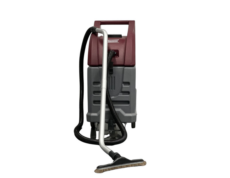 Minuteman Tsunami wet/dry vac (T16WD) set up for dry pickup, front view with hose, wand and floor brush on white