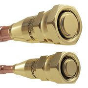 Close-up of the two brass Quick Connect fittings stamped MRCOOL on the copper lines