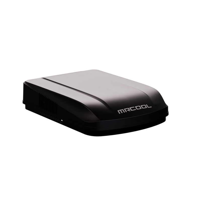 MRCOOL TravelCool rooftop RV heat pump in black, three-quarter view of the low rounded shell with MRCOOL lettering