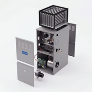 Exploded view of the VersaPro 80% furnace showing the tubular heat exchanger, control board, blower and removed doors