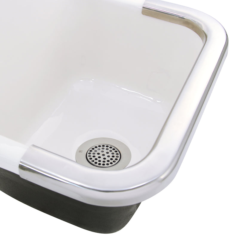 Nantucket Sinks 3CHGR polished grid drain installed in a white cast iron utility sink basin