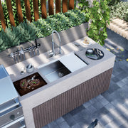 Nantucket Sinks AW-PS-3219-16 installed in a slatted outdoor kitchen island beside a grill