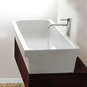 Nantucket Sinks Canal35-90 vessel sink installed on a dark wood vanity with a tall chrome faucet
