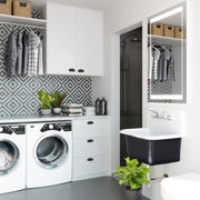 Nantucket Sinks CI-2218-FBSET wide view of a laundry room with the white and black utility sink beside the washer