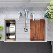 Nantucket Sinks DC-TFCPS colander and wood cutting board on a white fireclay workstation sink, top view