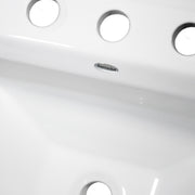 Nantucket Sinks DI-2320-R8 close-up of the three faucet holes, Nantucket logo and overflow