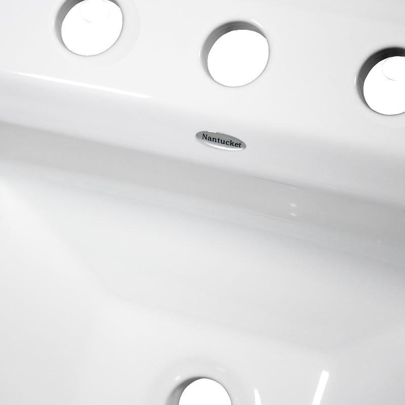 Nantucket Sinks DI-2320-R8 close-up of the three faucet holes, Nantucket logo and overflow
