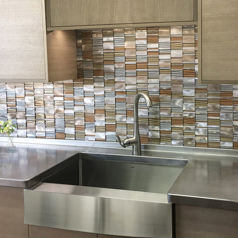 Nantucket Sinks EZApron30 installed under a stainless counter with a mosaic tile backsplash