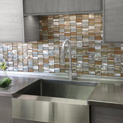 Nantucket Sinks EZApron33-9 installed under a stainless counter with a mosaic tile backsplash
