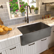 Nantucket Sinks FCFS3020S-Concrete Concrete farmhouse sink with marble counter, grey tile and beadboard cabinets